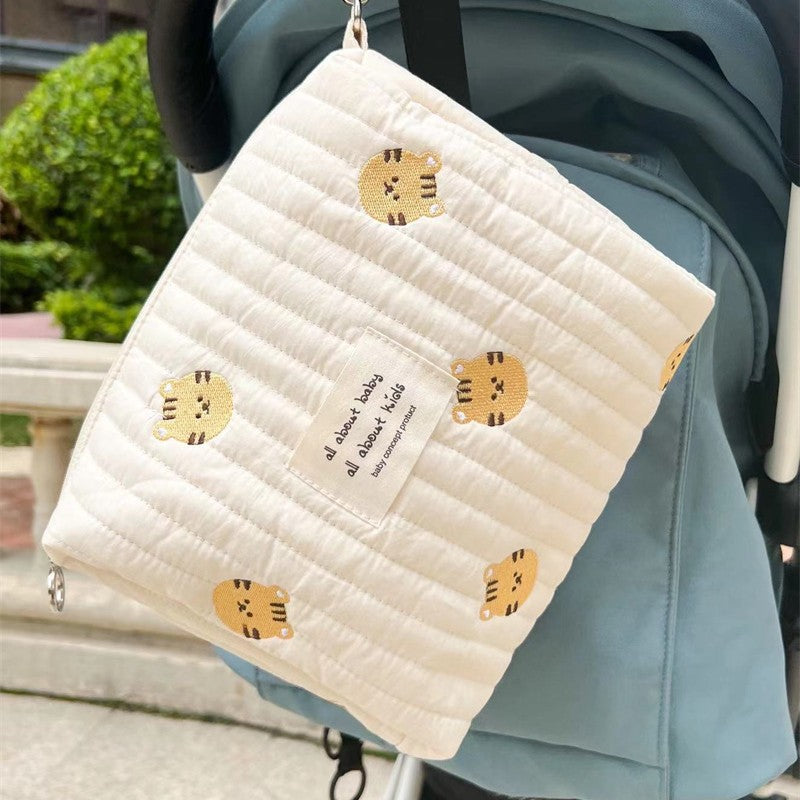 Embroidered Cotton Mommy Bag with Zipper Closure for Stroller Hanging, suitable for Diaper Bag use.