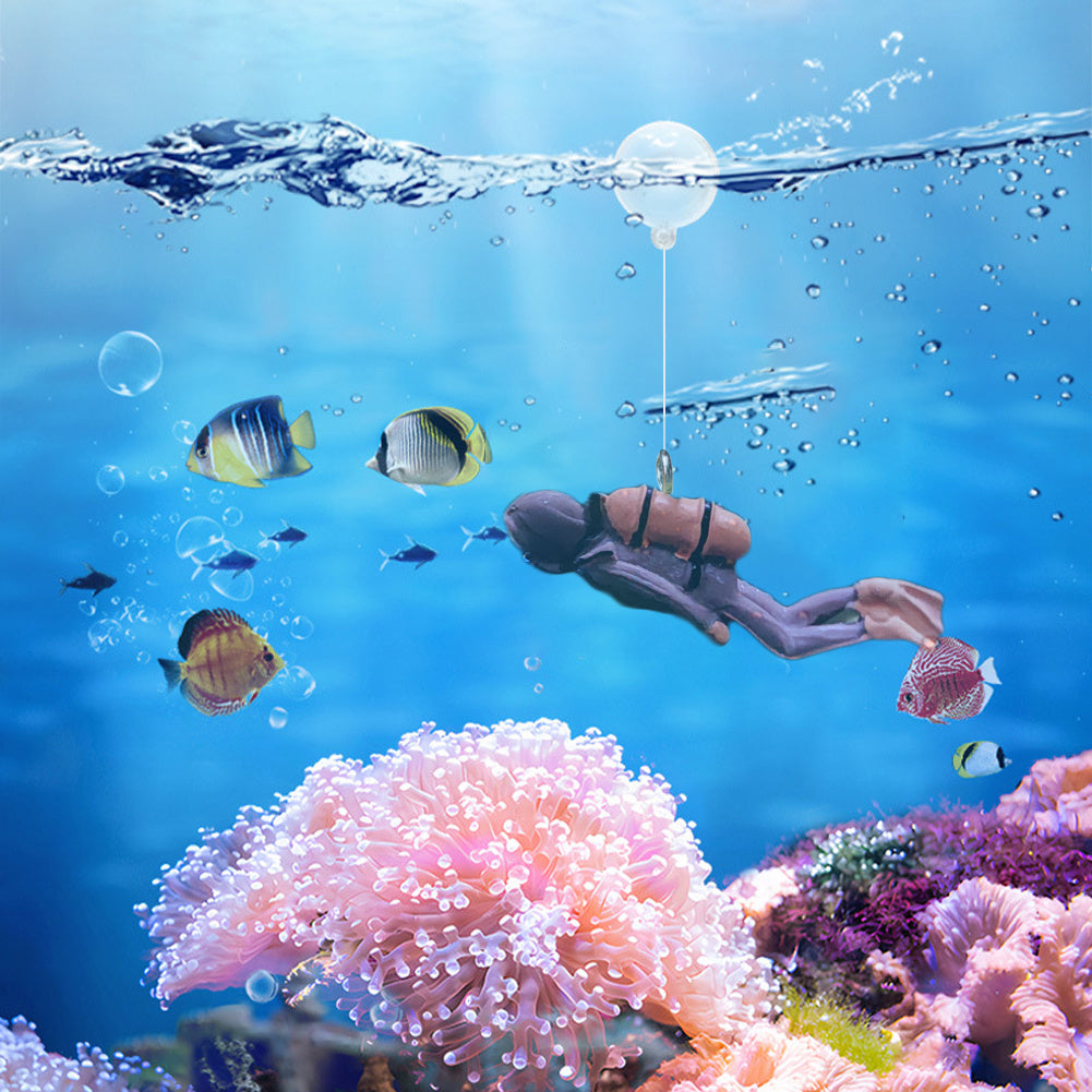 Colorful diver aquarium ornament adds vibrancy to underwater landscaping.