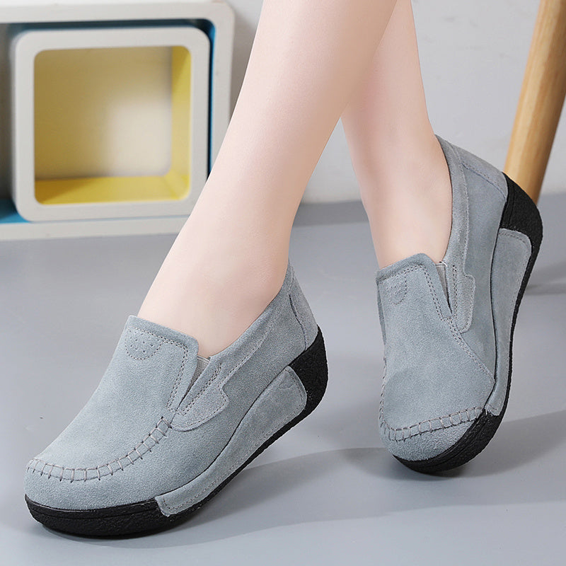 Women's slip-on platform loafers for stylish and comfortable outdoor walking.