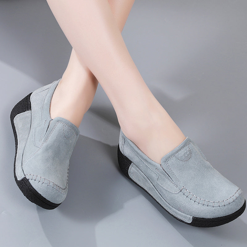 Women's slip-on platform loafers for stylish and comfortable outdoor walking.