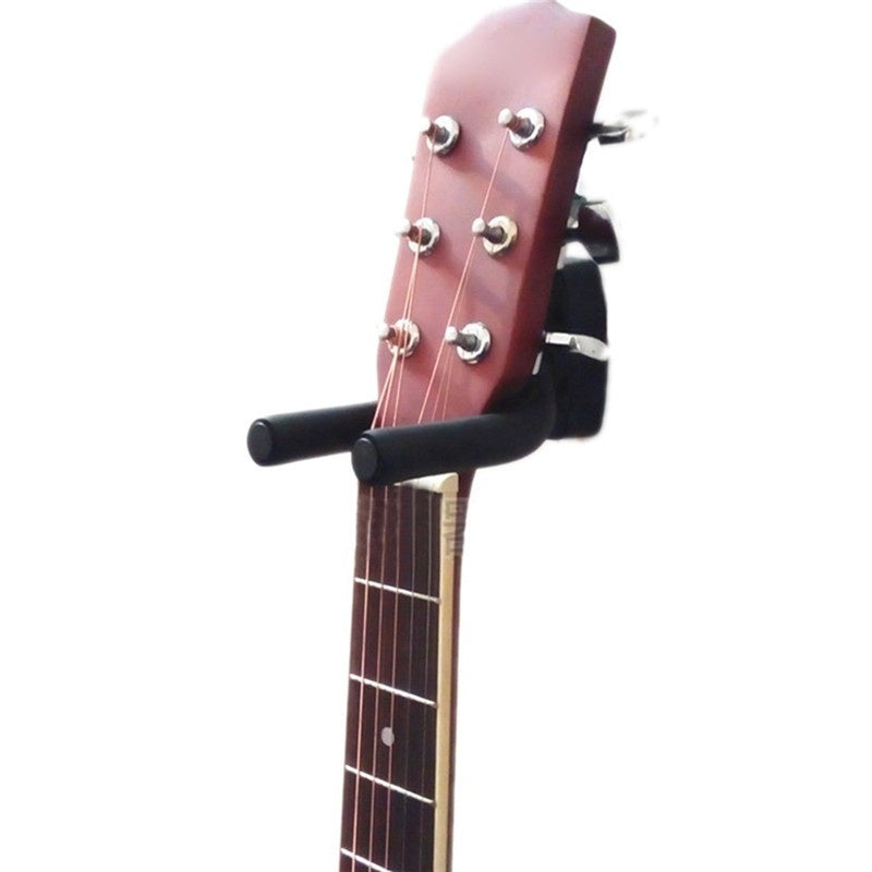 Display your guitar stylishly and securely with this wall mount, includes hooks and picks.