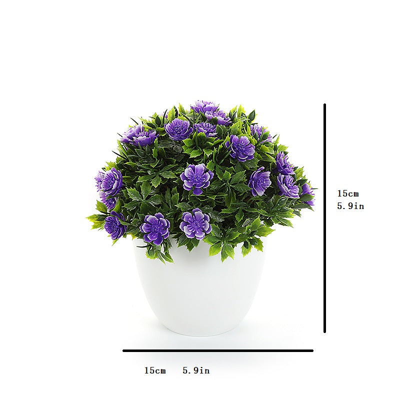 Artificial plant in small daisy pot, ideal for wedding, home, or bedroom decoration. Can be used for simulation or room decor.