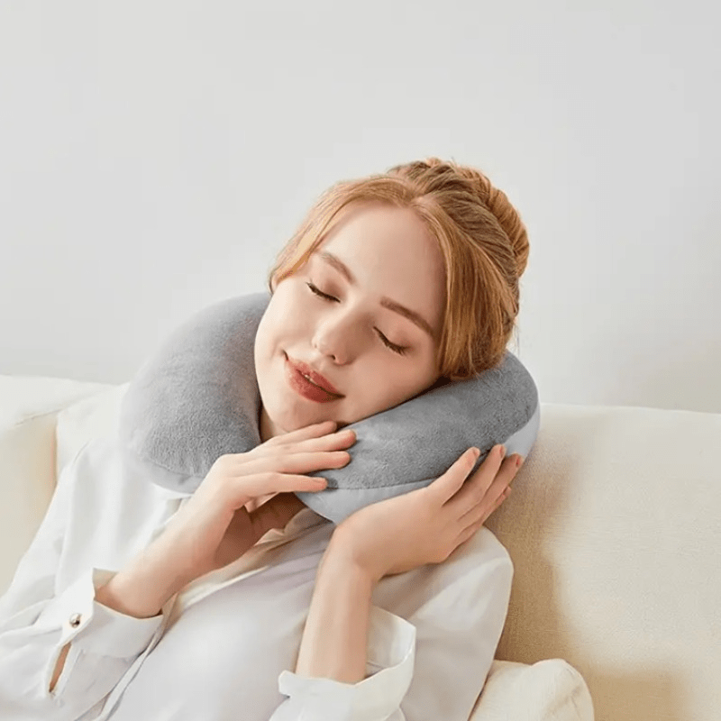 Travel in comfort with this Plush Memory Foam U-Shaped Travel Neck Pillow. Designed to provide optimal support for your head and neck, this cushion is perfect for long flights and daily relaxation. The machine washable cover makes it easy to keep clean