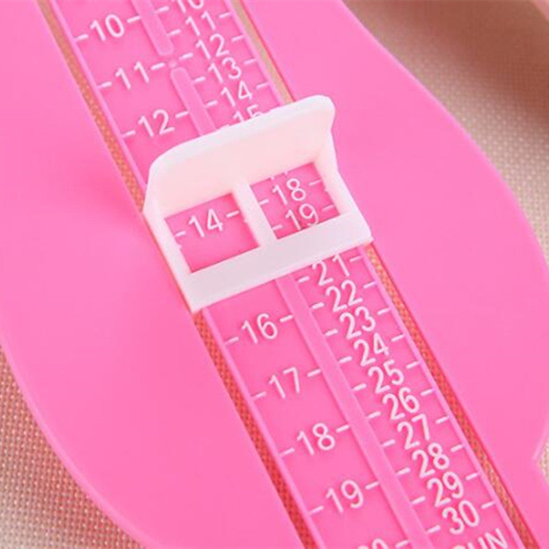 Baby foot measuring tool for shoes sizes.