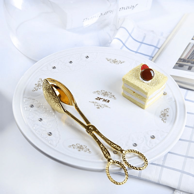 Versatile Gold-Plated Serving Tongs for Snacks, Salads, Bread, BBQ, Pastries, Cakes, and Fruit Salad - Essential Kitchen Tool for Every Occasion.