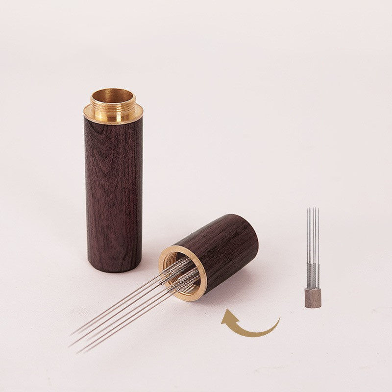 The Laoyeboubi Espresso Distribution Tool (WDT) is a stainless steel coffee stirrer needle distributor designed to create even grounds for optimal espresso extraction. This barista accessory allows for improved espresso extraction without the need for