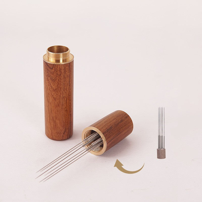 The Laoyeboubi Espresso Distribution Tool (WDT) is a stainless steel coffee stirrer needle distributor designed to create even grounds for optimal espresso extraction. This barista accessory allows for improved espresso extraction without the need for