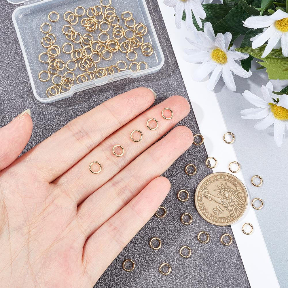 Each box contains 200 pieces of 304 Stainless Steel Open Jump Rings, suitable for DIY jewelry making. The rings are 18 gauge and have a 6x1mm size with an inner diameter of 4mm.