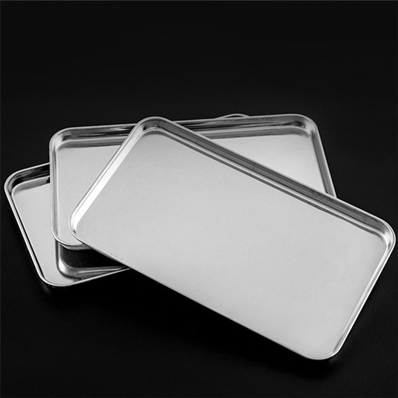 This stainless steel serving tray is perfect for kitchen use and is ideal for storing food, roasting fish on the BBQ, steaming dishes, and using as a baking pan. It is a versatile option for serving food.