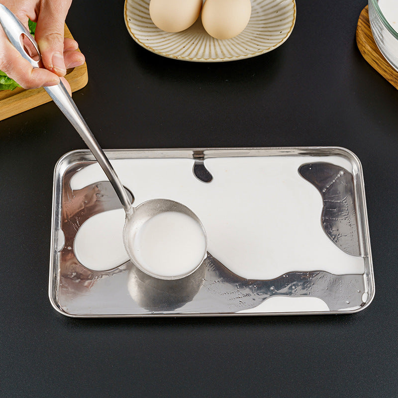 This stainless steel serving tray is perfect for kitchen use and is ideal for storing food, roasting fish on the BBQ, steaming dishes, and using as a baking pan. It is a versatile option for serving food.