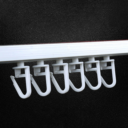 Set of 20 white plastic shower curtain hooks with pleated design for smooth movement. Durable and modern bathroom décor.