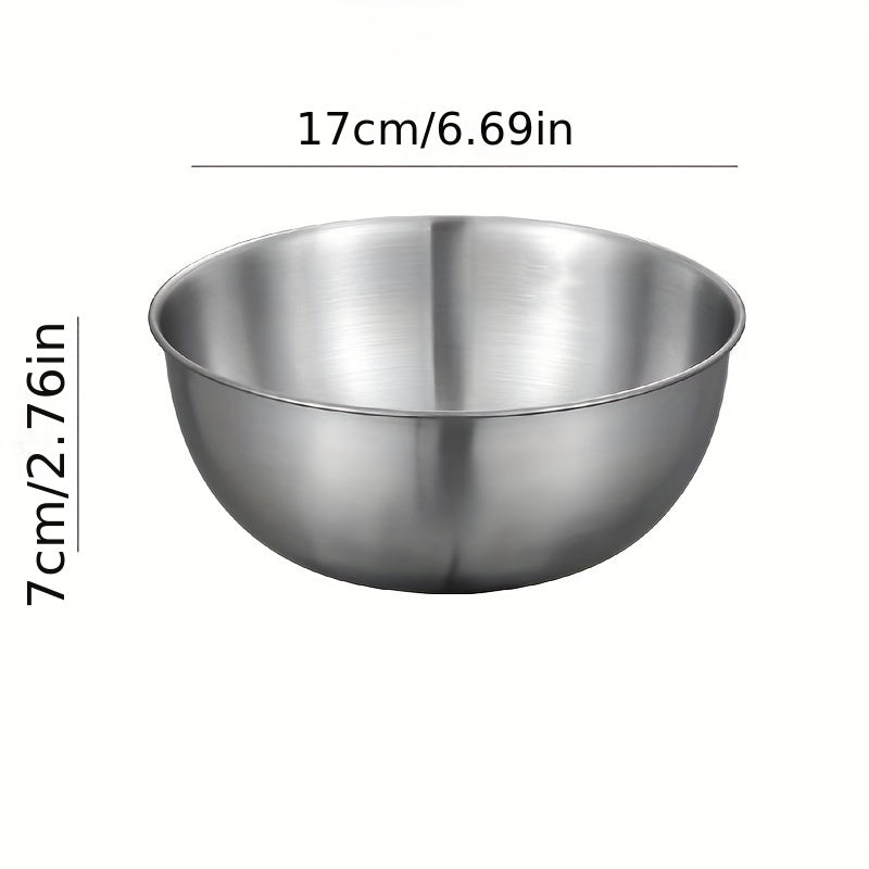 Set of 3 durable stainless steel mixing bowls for easy kitchen prep and storage.