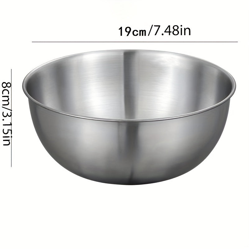 Set of 3 durable stainless steel mixing bowls for easy kitchen prep and storage.