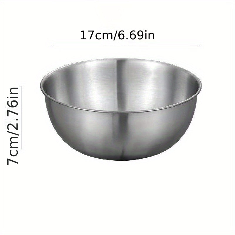 Set of 3 durable stainless steel mixing bowls for easy kitchen prep and storage.