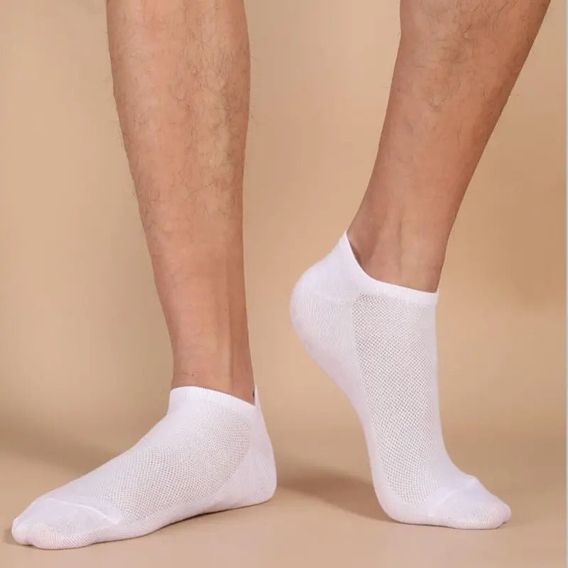 10/20 pairs of black, white, and grey ankle socks made of 100% polyester knit fabric. Solid colors, hand wash only. Breathable and sweat absorbent summer thin boat socks. Cute design.