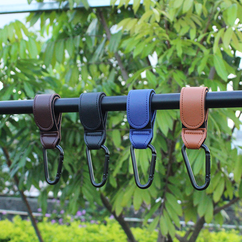 Get 2 Stroller Hooks made with Premium Vegan Faux Leather - Perfect for Hanging Diaper Bags, Grocery Shopping Bags, and more! Great as Pram Straps and a thoughtful Gift for Christmas, Halloween, Thanksgiving, or Easter.