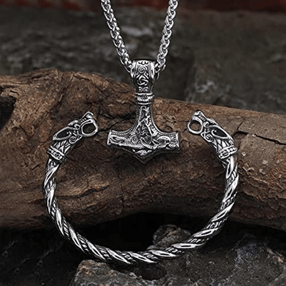 Set of 2 Viking Vintage Wolf Head Talisman Jewelry Pieces: Necklace and Bracelet. Featuring a Men's Nordic Hammer Pendant Necklace and a Women's Punk Hip Hop Handsome Necklace. High quality Wolf Head Bracelet included in this Fashion Jewelry Set, perfect