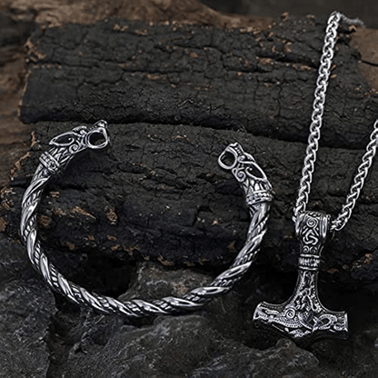 Set of 2 Viking Vintage Wolf Head Talisman Jewelry Pieces: Necklace and Bracelet. Featuring a Men's Nordic Hammer Pendant Necklace and a Women's Punk Hip Hop Handsome Necklace. High quality Wolf Head Bracelet included in this Fashion Jewelry Set, perfect