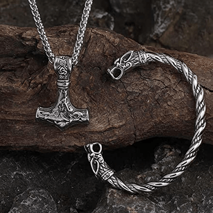 Set of 2 Viking Vintage Wolf Head Talisman Jewelry Pieces: Necklace and Bracelet. Featuring a Men's Nordic Hammer Pendant Necklace and a Women's Punk Hip Hop Handsome Necklace. High quality Wolf Head Bracelet included in this Fashion Jewelry Set, perfect