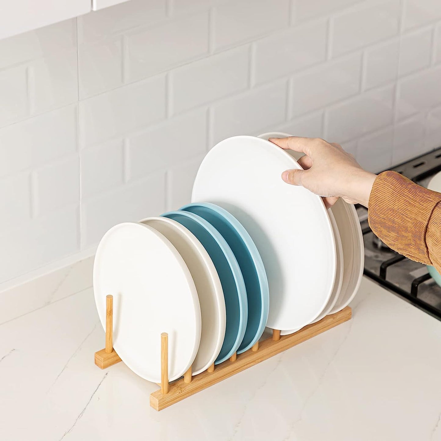 Keep your kitchen organized and clutter-free with this versatile 1pc Bamboo Rack. Use it to store dishes, plates, bowls, cups, books, pots, lids, cutting boards, and more. This stand drainer doubles as a storage holder and organizer for your kitchen