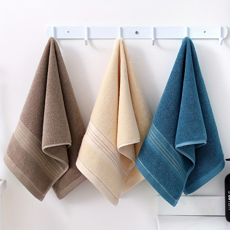 High-quality 100% cotton hand towels with modern striped pattern, 500 GSM, and super absorbent knit fabric. Suitable for bathroom, face, and hair. Perfect for home, hotel souvenirs, and holiday gifts.