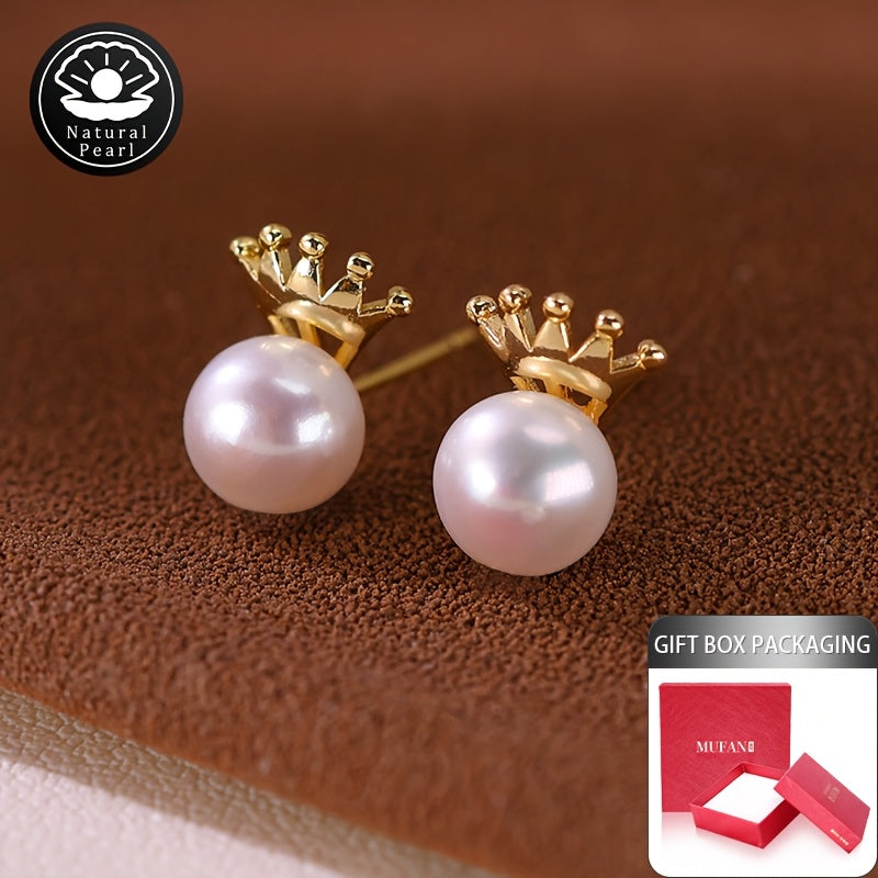 These MUFAN Elegant Luxury Stud Earrings feature a pair of 7-8mm Flat Round Natural Freshwater Pearls adorned with a Small Crown design. They are the perfect June Birthstone accessory for daily wear or gifting, making them a versatile choice for all