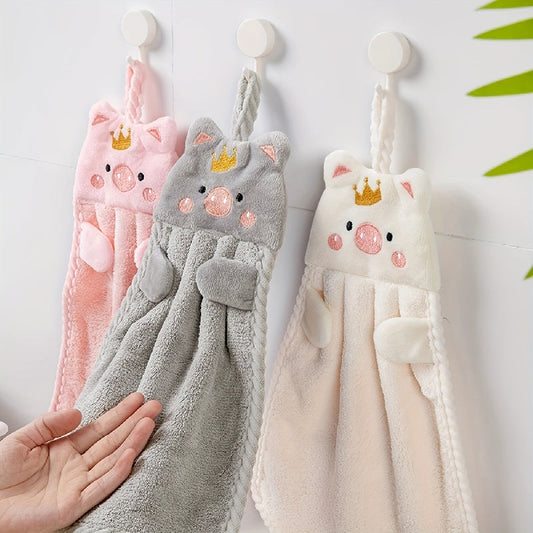 Four adorable pig-themed hand towels made from absorbent coral velvet, perfect for use in the kitchen or as household towels with hanging loops.