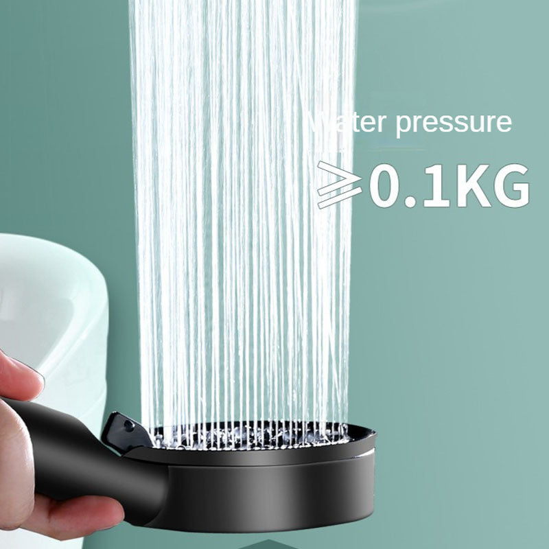 Handheld shower head with 5 spray modes in energy-saving ABS material, wall-mounted and enhances shower experience with various settings.