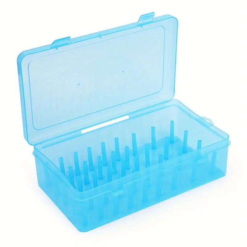 Plastic sewing threads box with bobbins and needle spool organizer. Transparent case for DIY sewing.