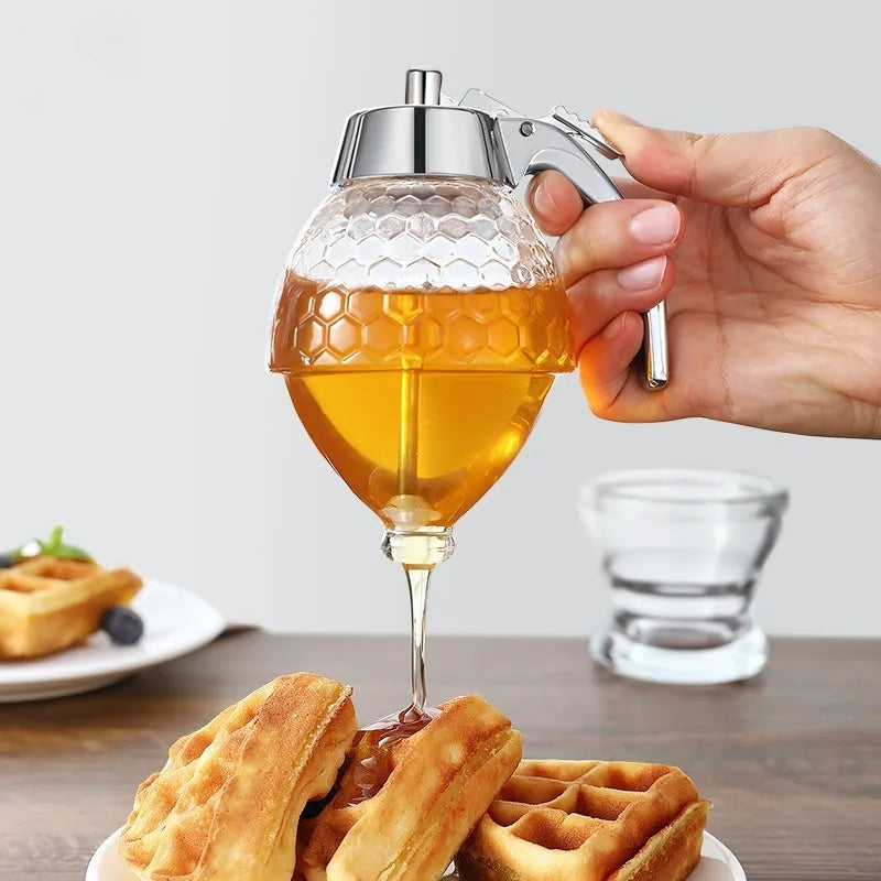 ABS Honey Dispenser with Honeycomb Design, Food-Safe Storage Jar for Liquid Sauces, Oils, Juices, and Syrups. Includes Squeeze Bottle for Easy Dispensing. Perfect Kitchen Bar Organizer, No Electricity Required.