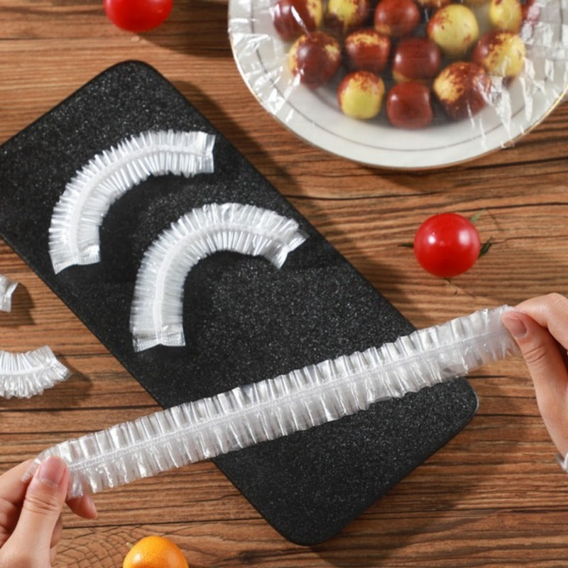 100 reusable stretch storage bags for household kitchen use, including disposable plastic wrap bags, leftovers cover, bowl cover, dish cover, and shower cap. These kitchen accessories are perfect for keeping your food fresh and organized.