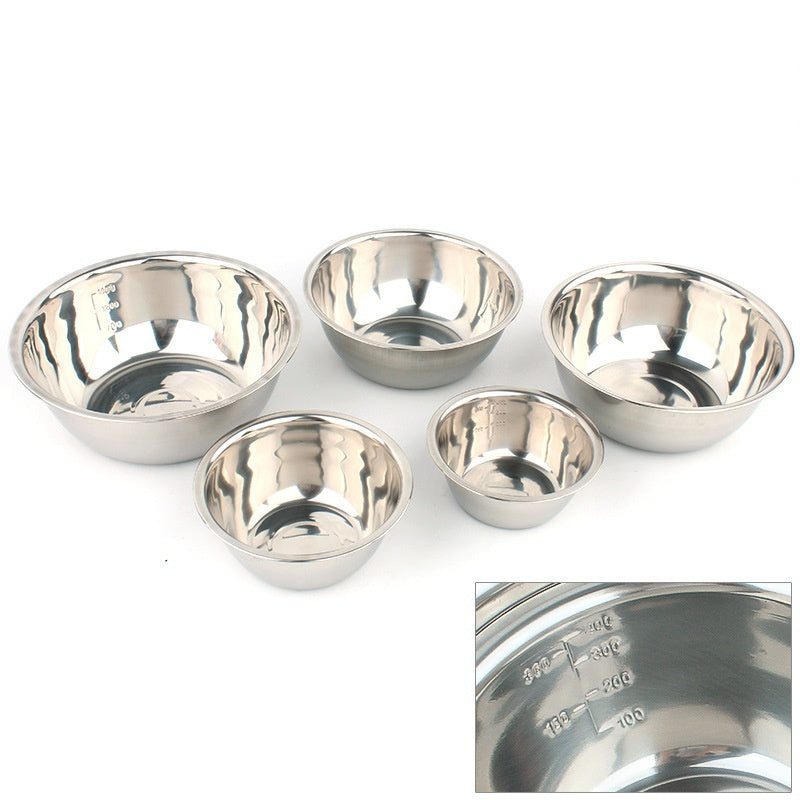 Set of 5 stainless steel mixing bowls with non-slip bottoms - Ideal for cooking and baking in the kitchen - Nesting design for convenient storage.