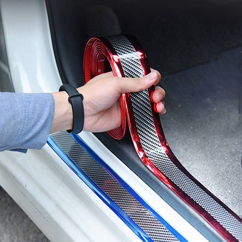 Car door sill protection strip with carbon fiber design to prevent scratches and add style to your vehicle.