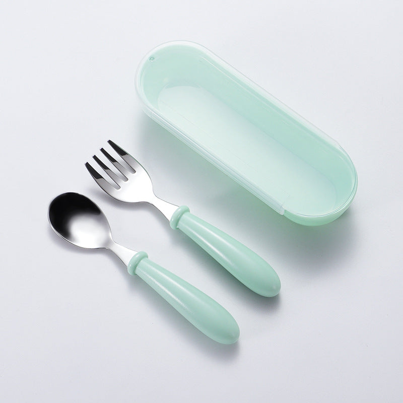 Set of 3 stainless steel youngsters' utensils with colorful handles, dishwasher safe. Includes fork and spoon in blue geometric pattern in pink and green cases.