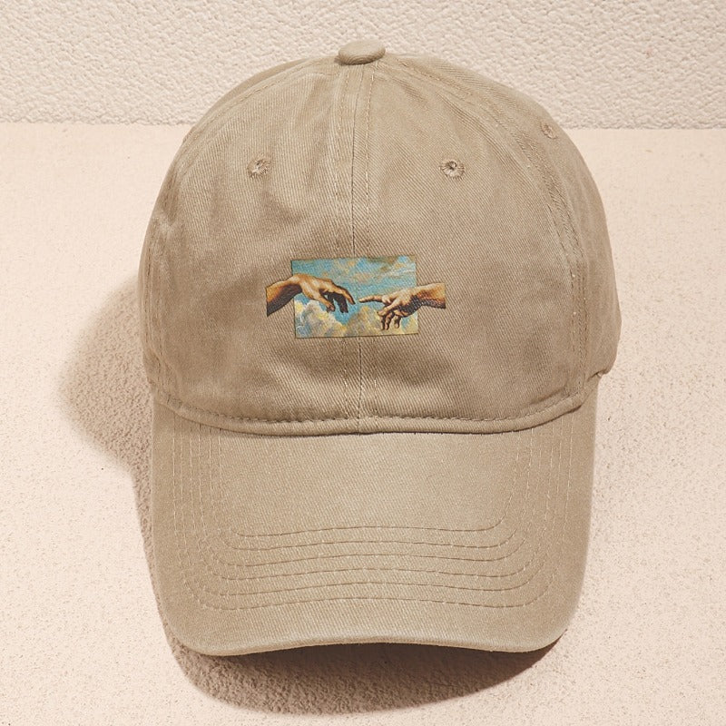 Vintage oil painting print baseball cap made of breathable polyester with casual embroidery. Features a flag theme, adjustable fit, and is hand washable.