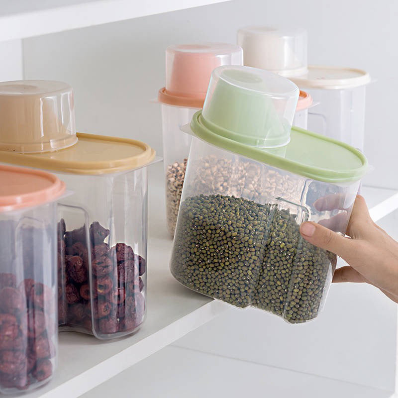 Set of four PP food storage boxes with clear plastic containers and pour lids, perfect for storing cereal, rice, pasta, tea, nuts, and coffee beans. Ideal for preserving food in the kitchen at home.