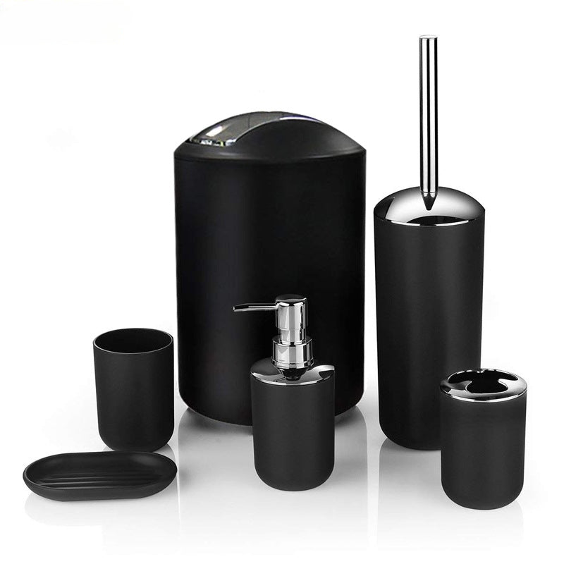 Plastic bathroom accessory set includes soap dispenser, toothbrush holder, toilet brush, trash can, tumbler, and soap dish.