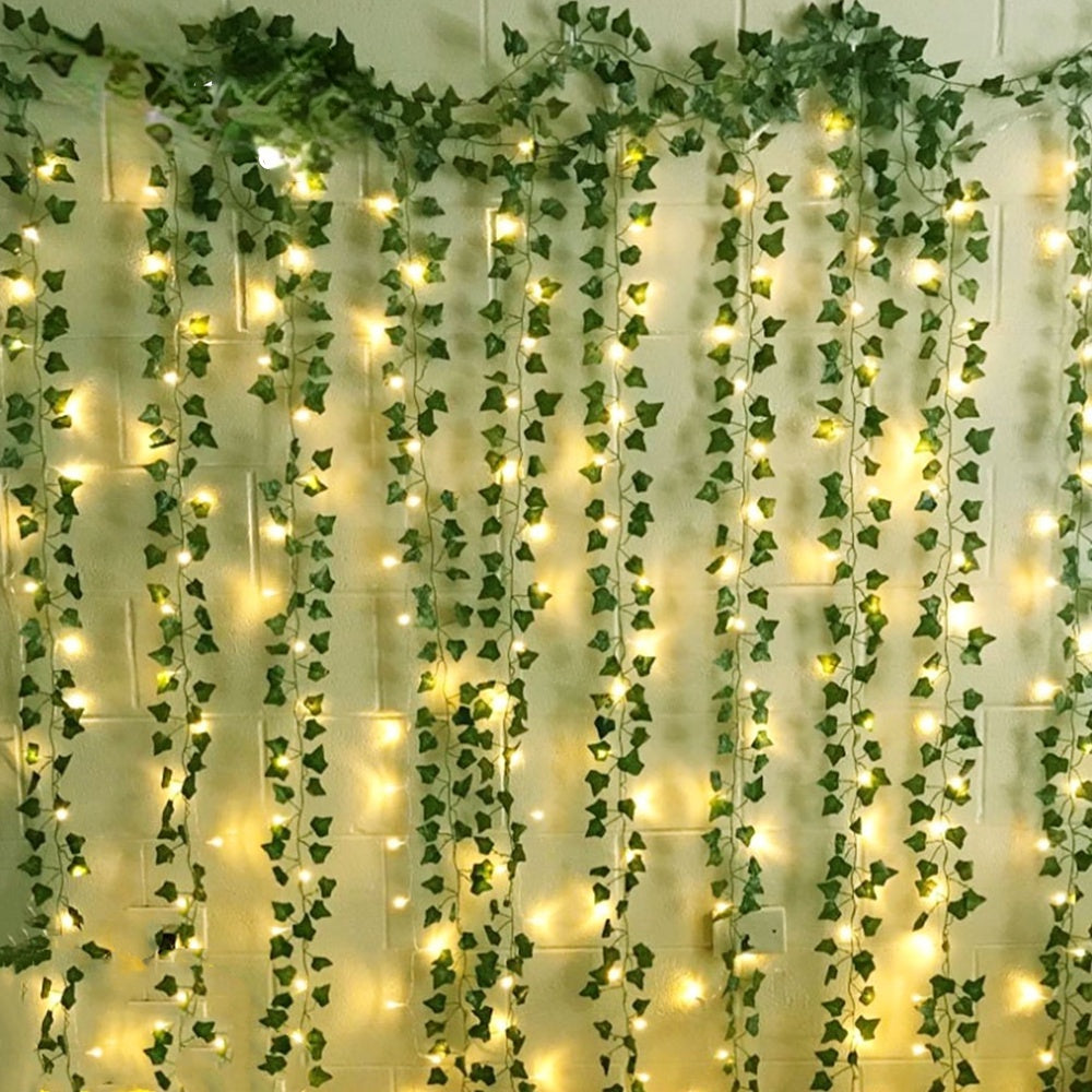 2m artificial ivy vine with 20 LED lights, perfect for home decor during Christmas and Halloween. Battery powered, no plug needed.