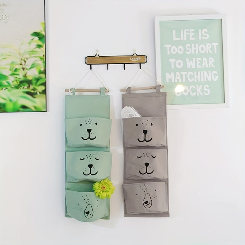 Get organized with this adorable Hanging Storage Bag featuring a Cartoon Pattern design! Perfect for keeping small items tidy in your bedroom, this versatile wall-mounted bag is 60cm in length and makes a great gift for Easter, Halloween, or Christmas.