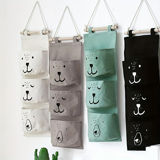 Get organized with this adorable Hanging Storage Bag featuring a Cartoon Pattern design! Perfect for keeping small items tidy in your bedroom, this versatile wall-mounted bag is 60cm in length and makes a great gift for Easter, Halloween, or Christmas.