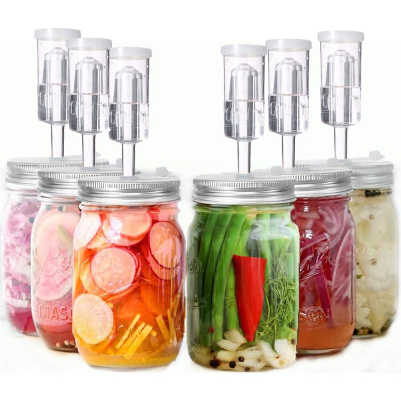 Set of 4 fermentation lids designed for wide mouth jars, including 4 stainless steel fermenting lids, 4 silicone grommets, 4 airlocks, and 4 silicone rings. Jars not included.