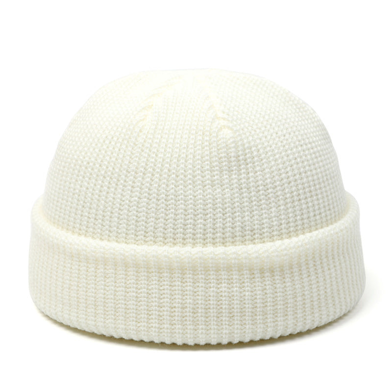 Stay stylish and warm this season with our fashionable Simple Warm Skullies Beanie Hat. Available in plain colors for a chic autumn and winter look. Makes the perfect gift choice.