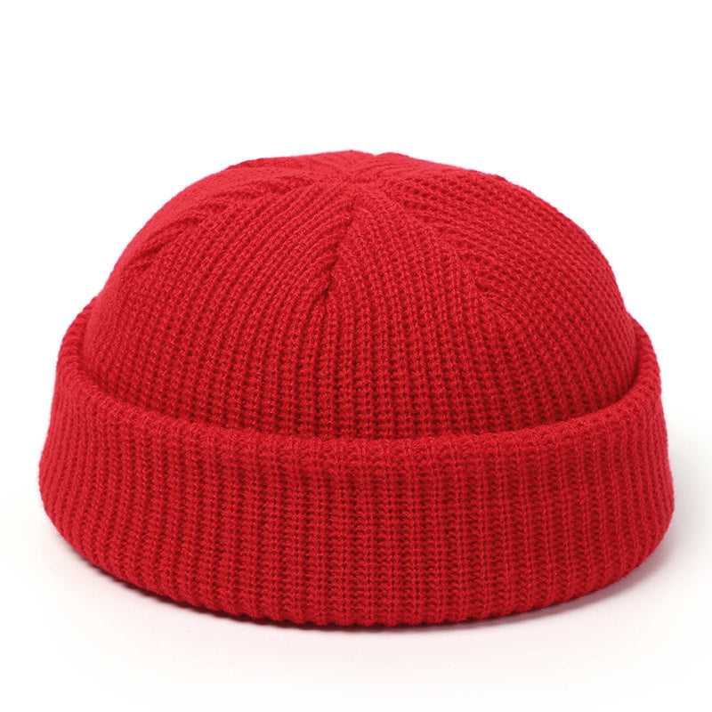 Stay stylish and warm this season with our fashionable Simple Warm Skullies Beanie Hat. Available in plain colors for a chic autumn and winter look. Makes the perfect gift choice.