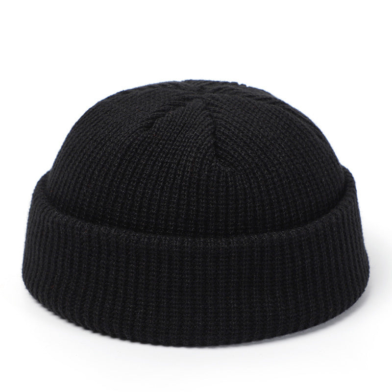 Stay stylish and warm this season with our fashionable Simple Warm Skullies Beanie Hat. Available in plain colors for a chic autumn and winter look. Makes the perfect gift choice.