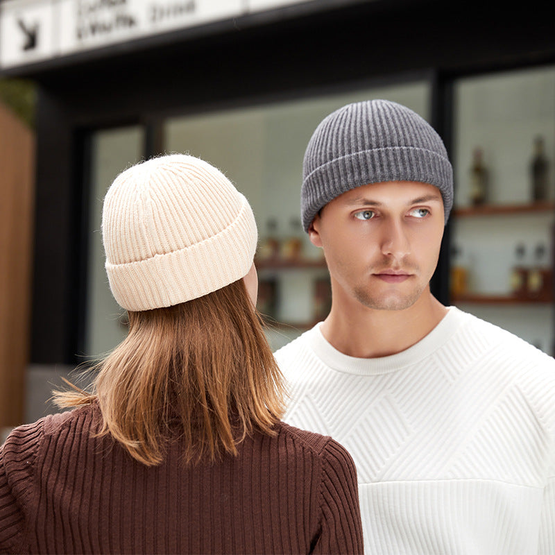 Stay stylish and warm this season with our fashionable Simple Warm Skullies Beanie Hat. Available in plain colors for a chic autumn and winter look. Makes the perfect gift choice.