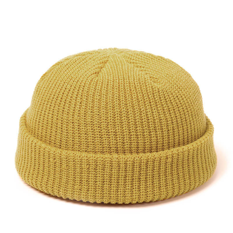 Stay stylish and warm this season with our fashionable Simple Warm Skullies Beanie Hat. Available in plain colors for a chic autumn and winter look. Makes the perfect gift choice.