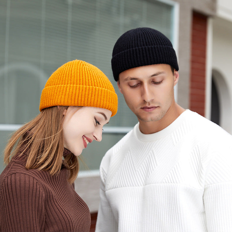 Stay stylish and warm this season with our fashionable Simple Warm Skullies Beanie Hat. Available in plain colors for a chic autumn and winter look. Makes the perfect gift choice.