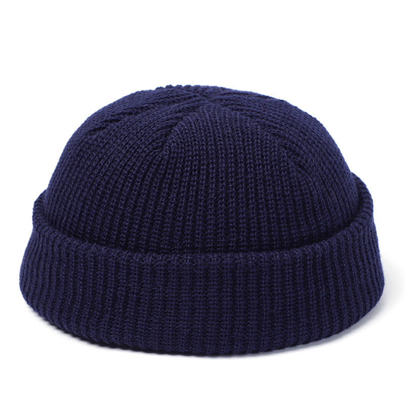 Stay stylish and warm this season with our fashionable Simple Warm Skullies Beanie Hat. Available in plain colors for a chic autumn and winter look. Makes the perfect gift choice.