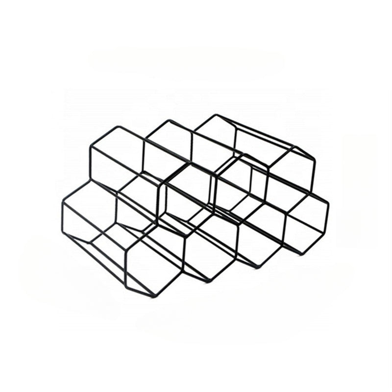 Elegant black metal honeycomb wine rack holds 7 bottles with a hexagonal grid design for living room or kitchen display.