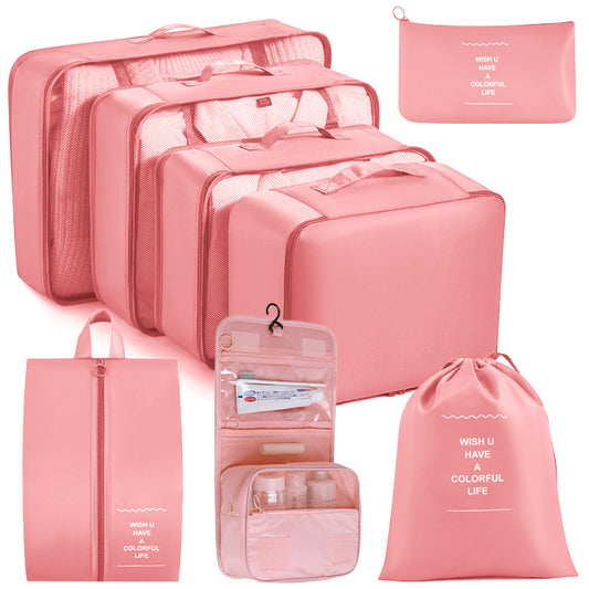 Pink Travel Organizer Set with 8 pieces, adjustable straps, zip closure, and "WISH U HAVE A COLORFUL LIFE" motif, made of polyester for luggage and toiletries.